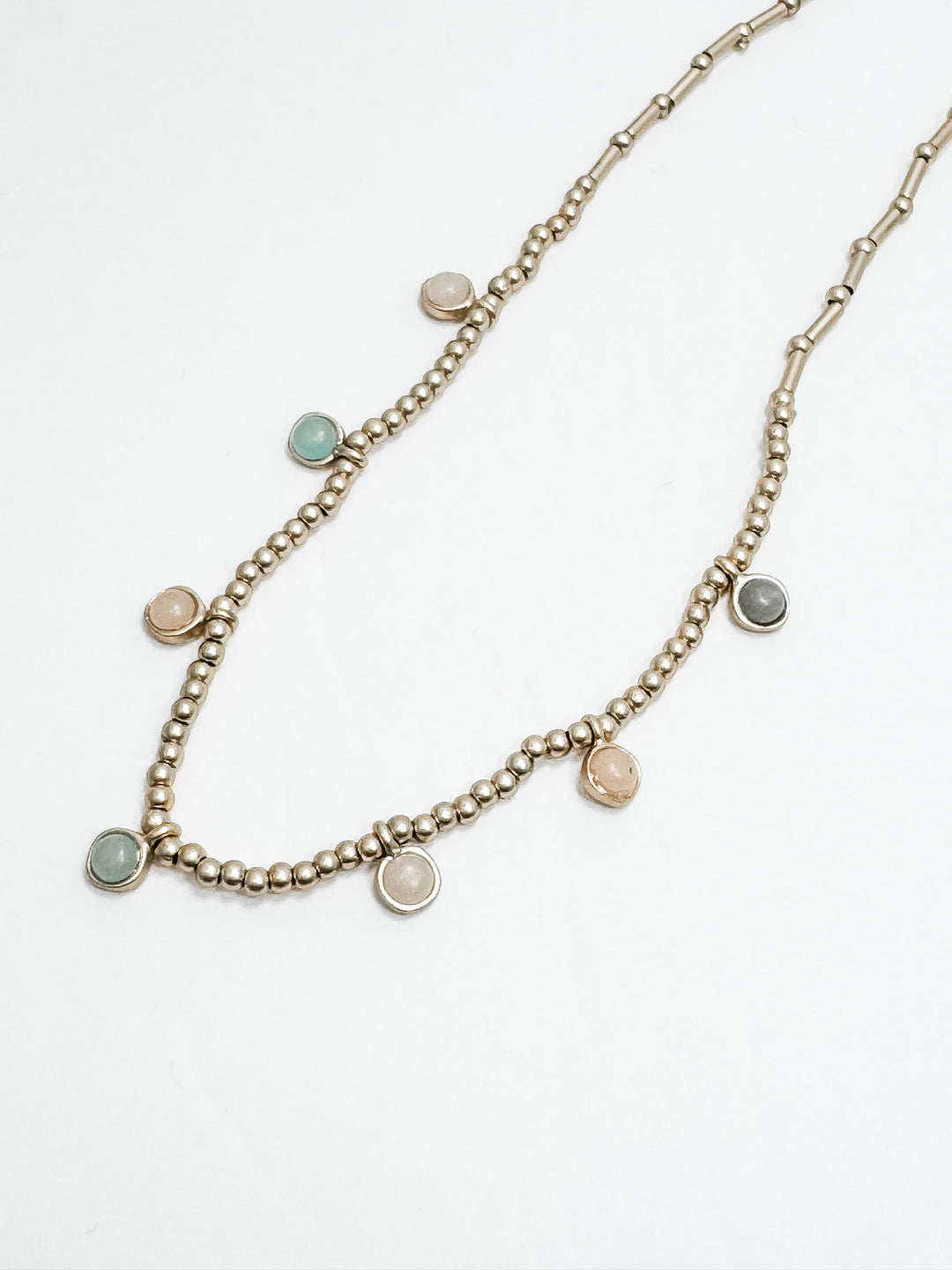 Gold Necklace w/ Neutral Colored Charm Details