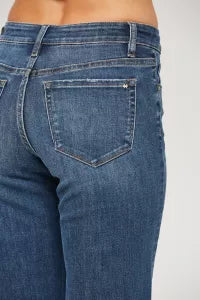 back view woman wearing blue jeans