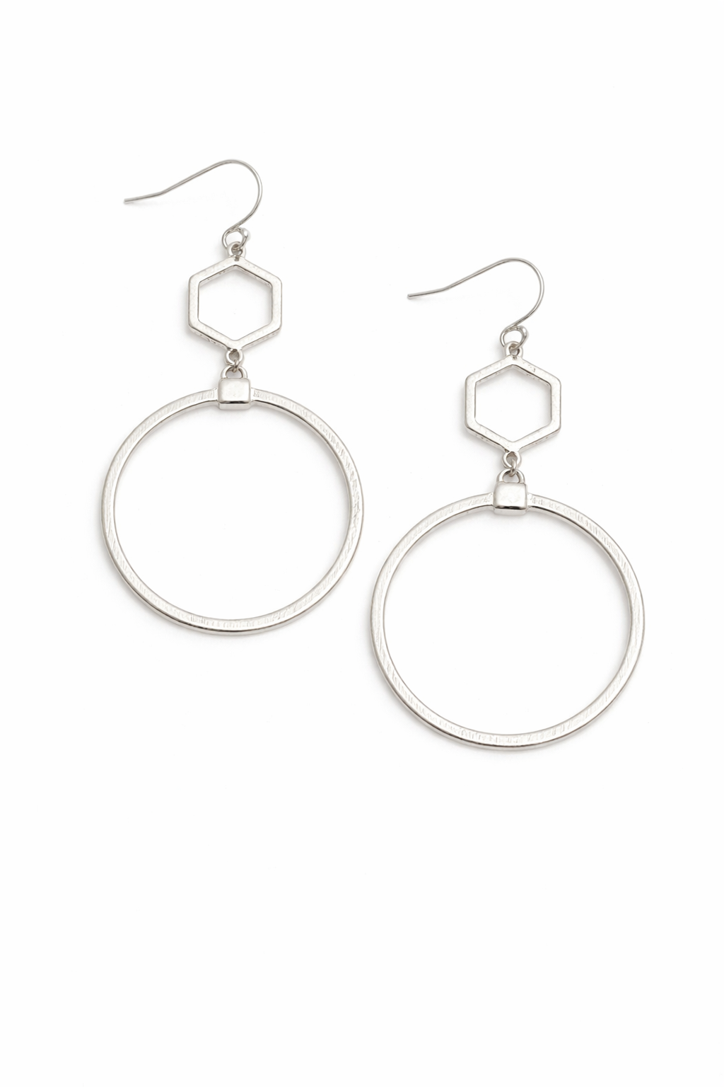 Silver hoop earrings with hexagonal accents on a white background
