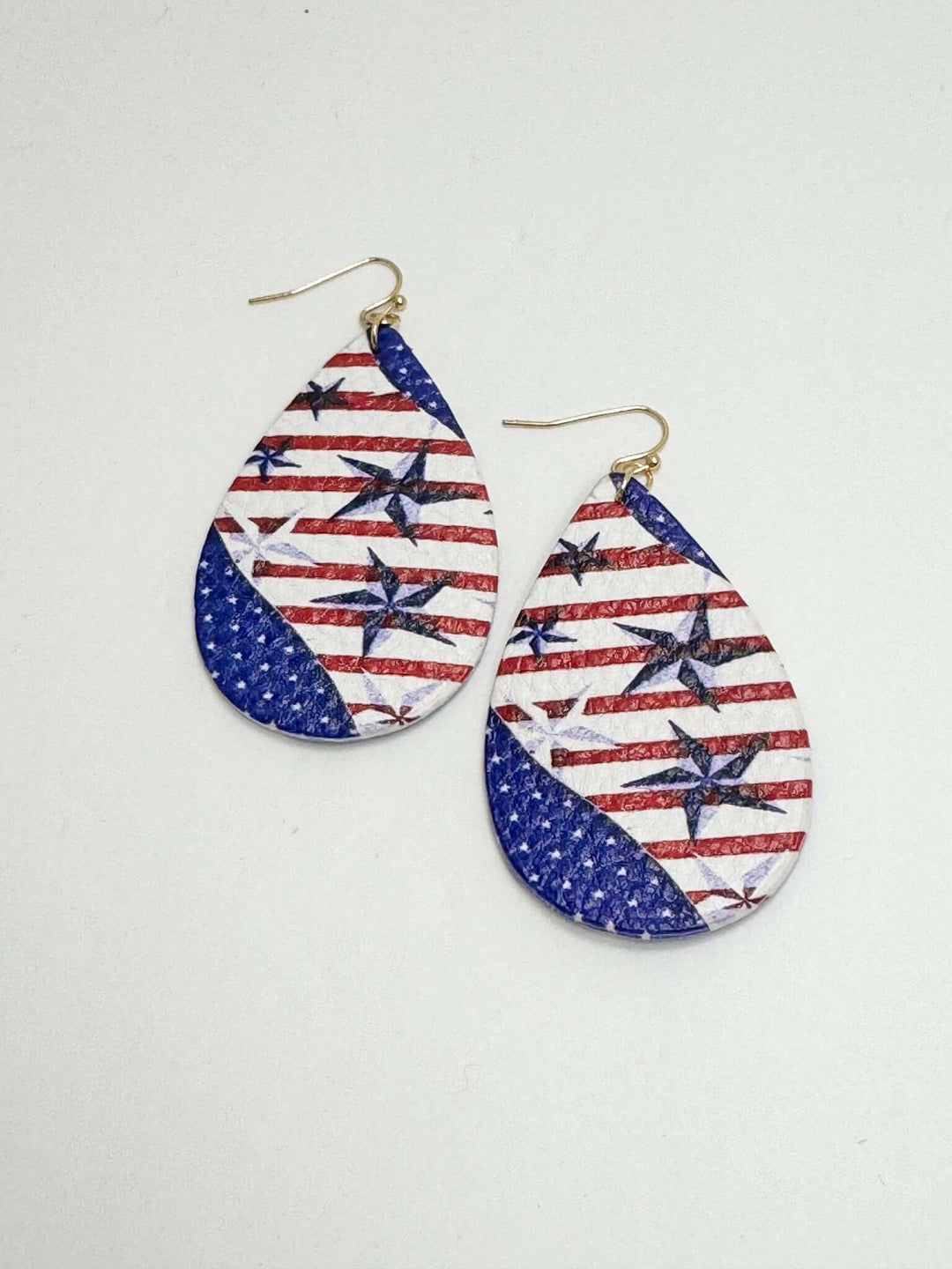 A pair of Stars & Stripes patterned earrings with a patriotic red, white, and blue color scheme, displayed against a white background.