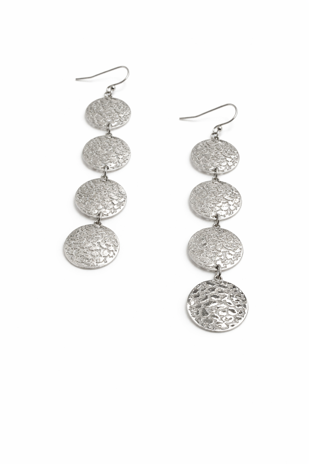 Pair of silver dangling earrings on a white background