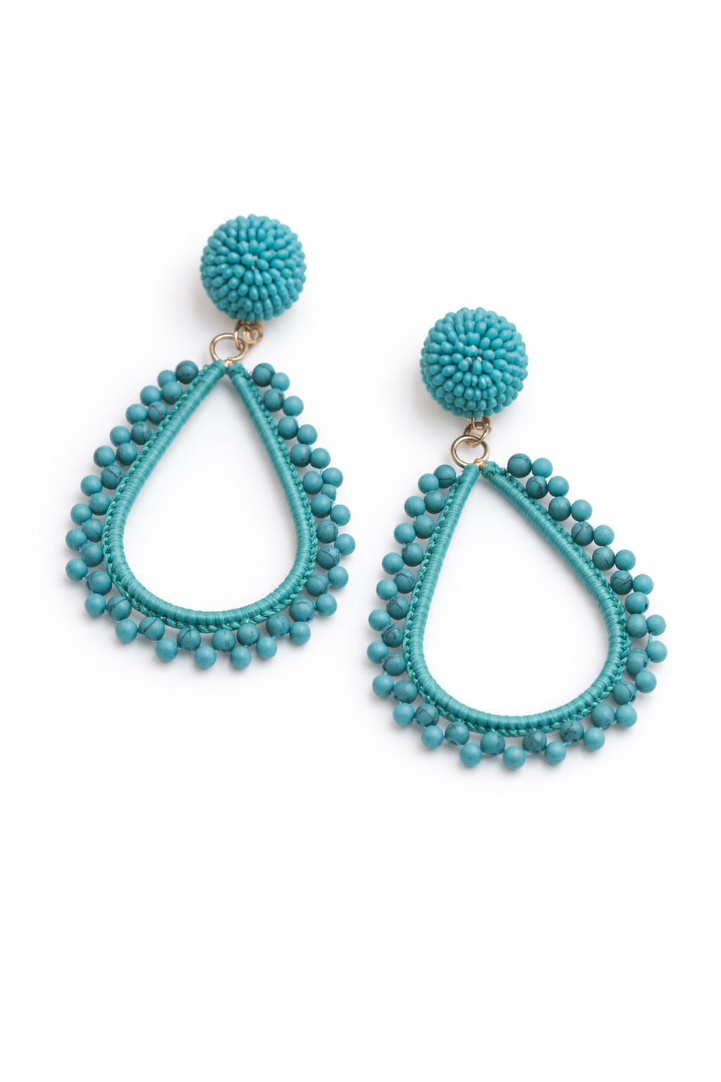 Turquoise beaded earrings on a white background