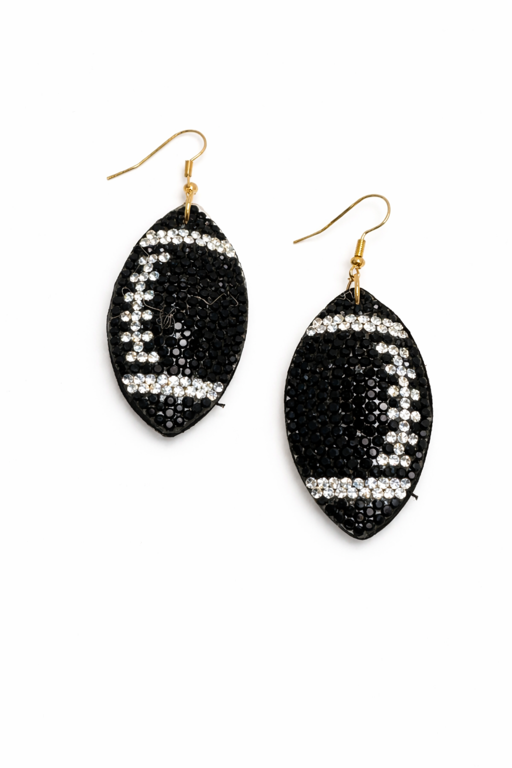 Black earrings with white rhinestone details on a white background