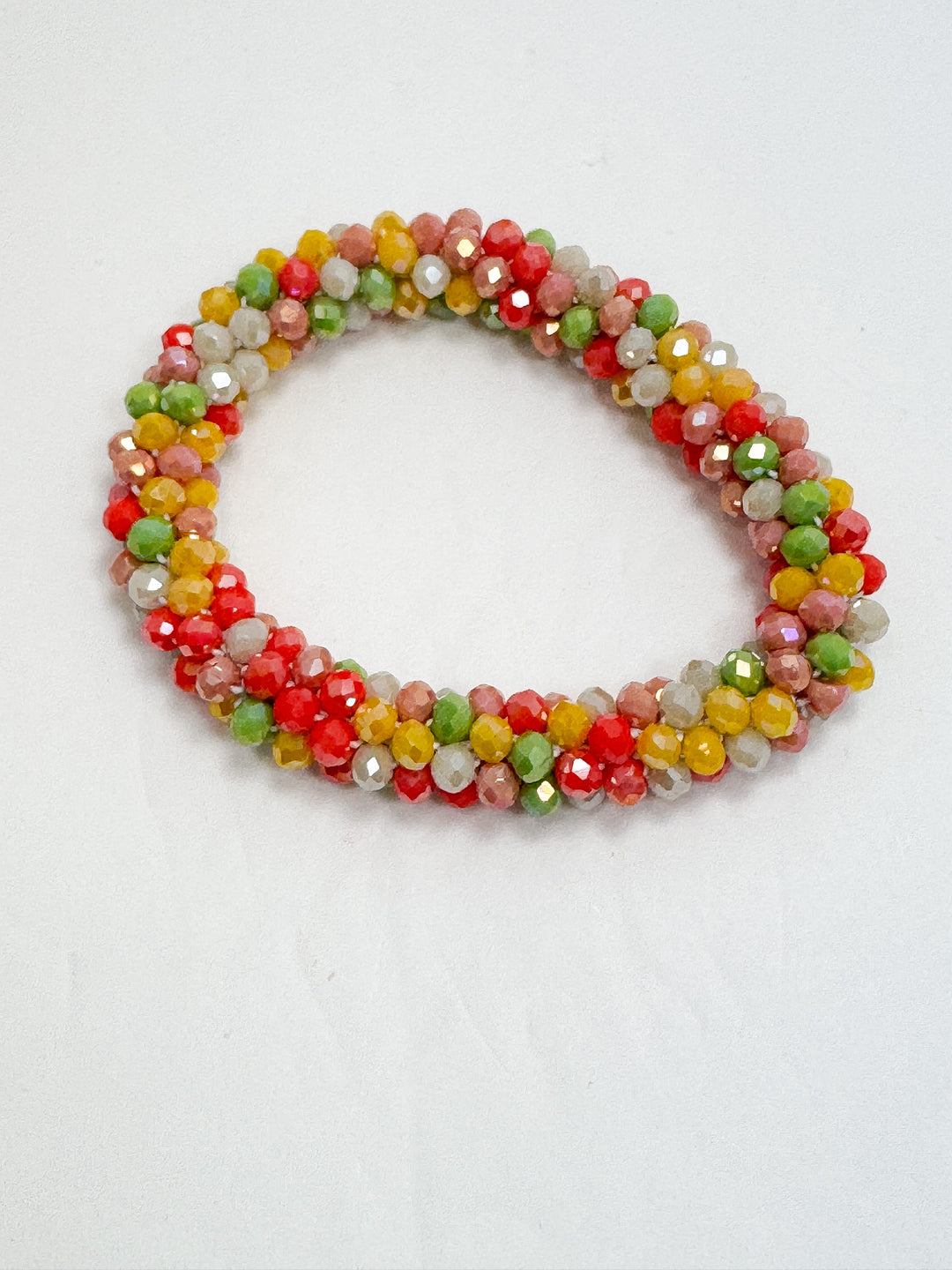 Multicolored beaded bracelet on a white background