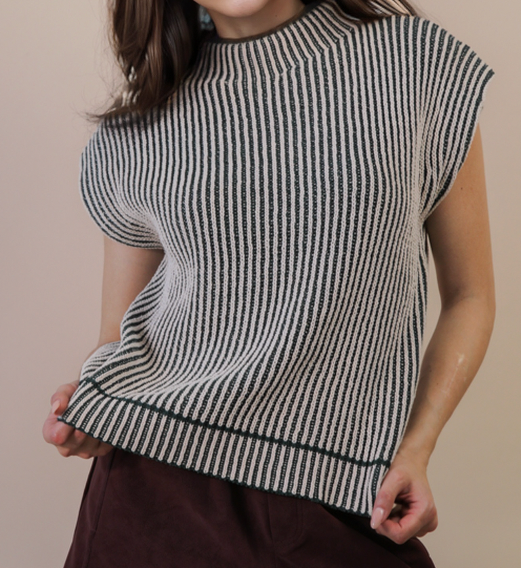 model wearing a striped sweater