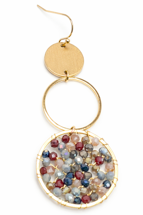 Gold earrings with multicolored bead embellishments on a white background