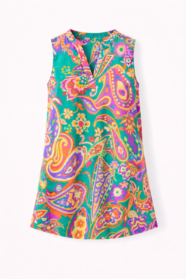 Colorful paisley-patterned dress on a white background