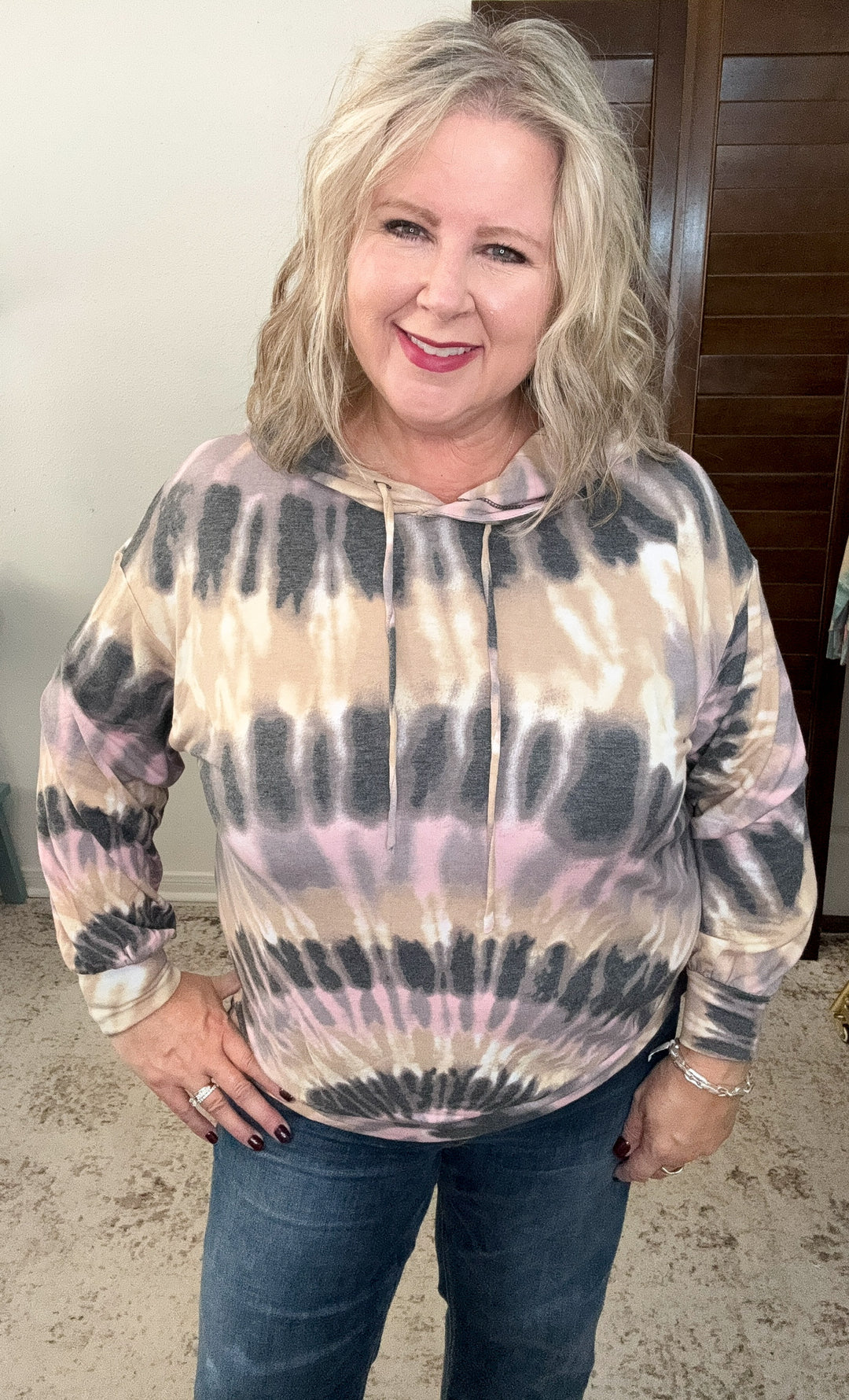 woman earing neutral tie dye hoodie