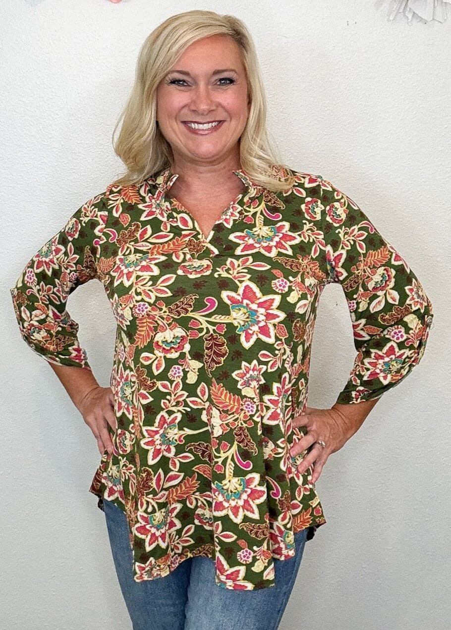 model wearing olive floral top 
