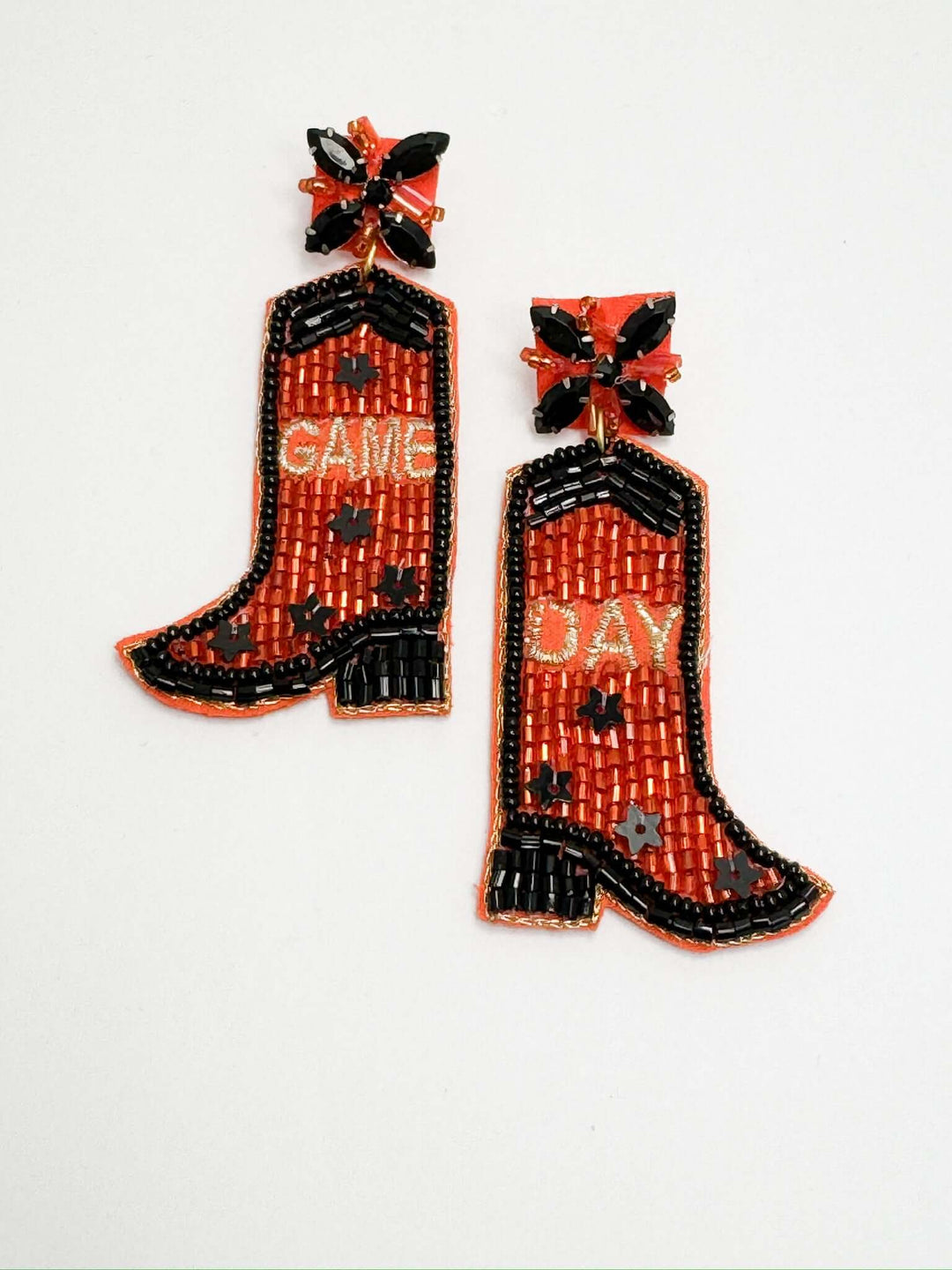 beaded orange and black gameday earrings in boot design