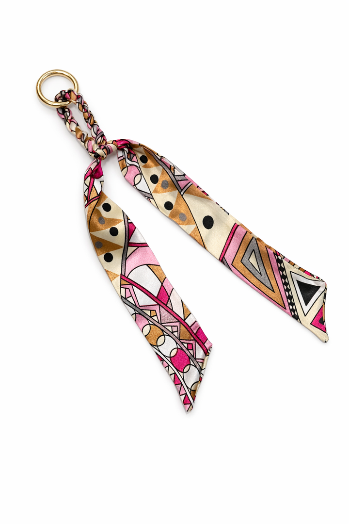 Colorful patterned keychain strap on a white background