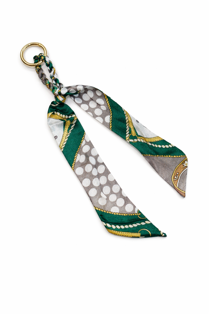 Patterned scarf keychain on a white background