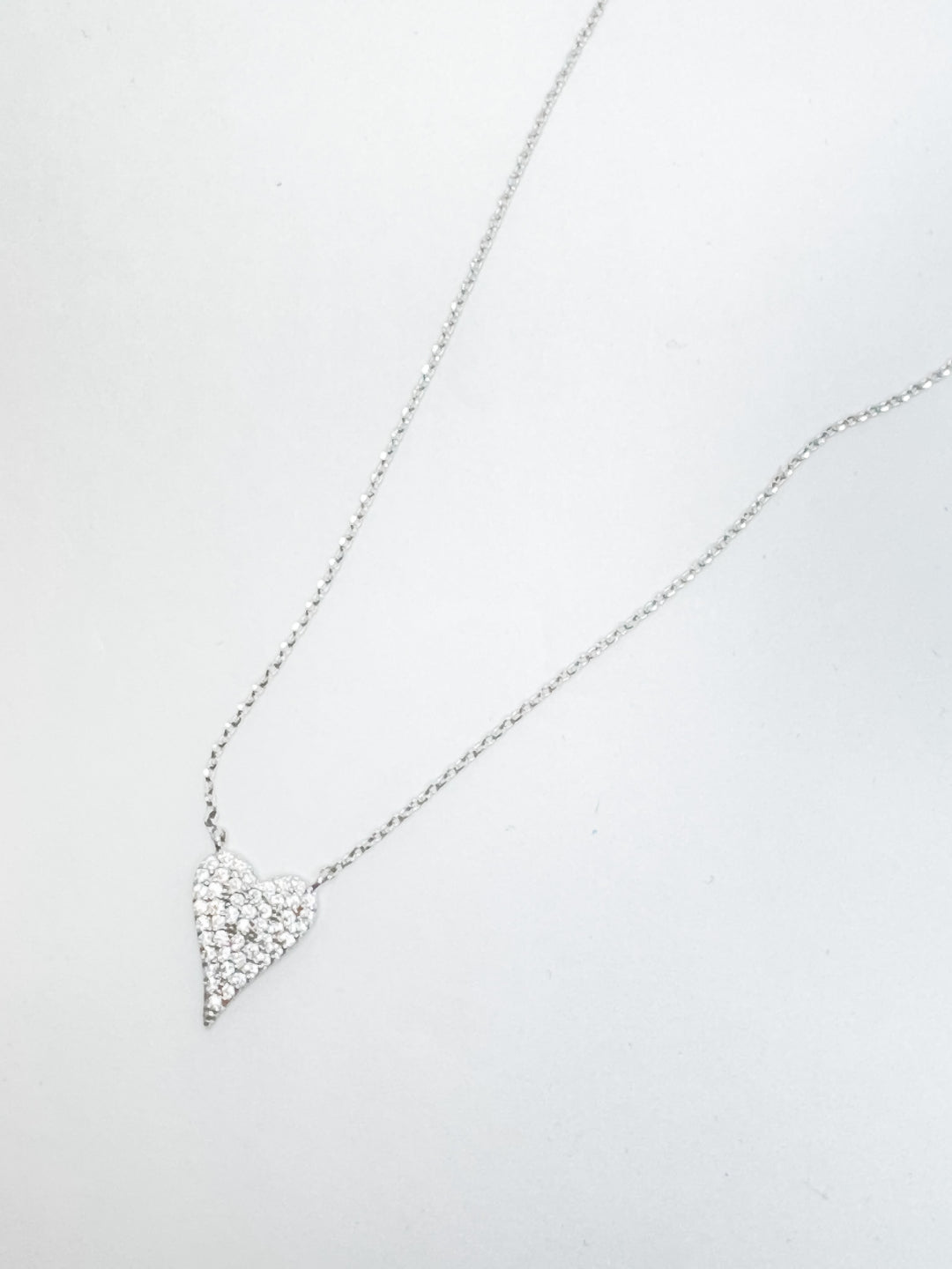 silver necklace with clear rhinestone heart pendant