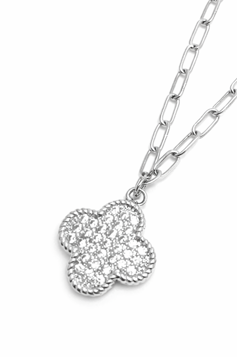 Silver necklace with a heart-shaped pendant on a white background