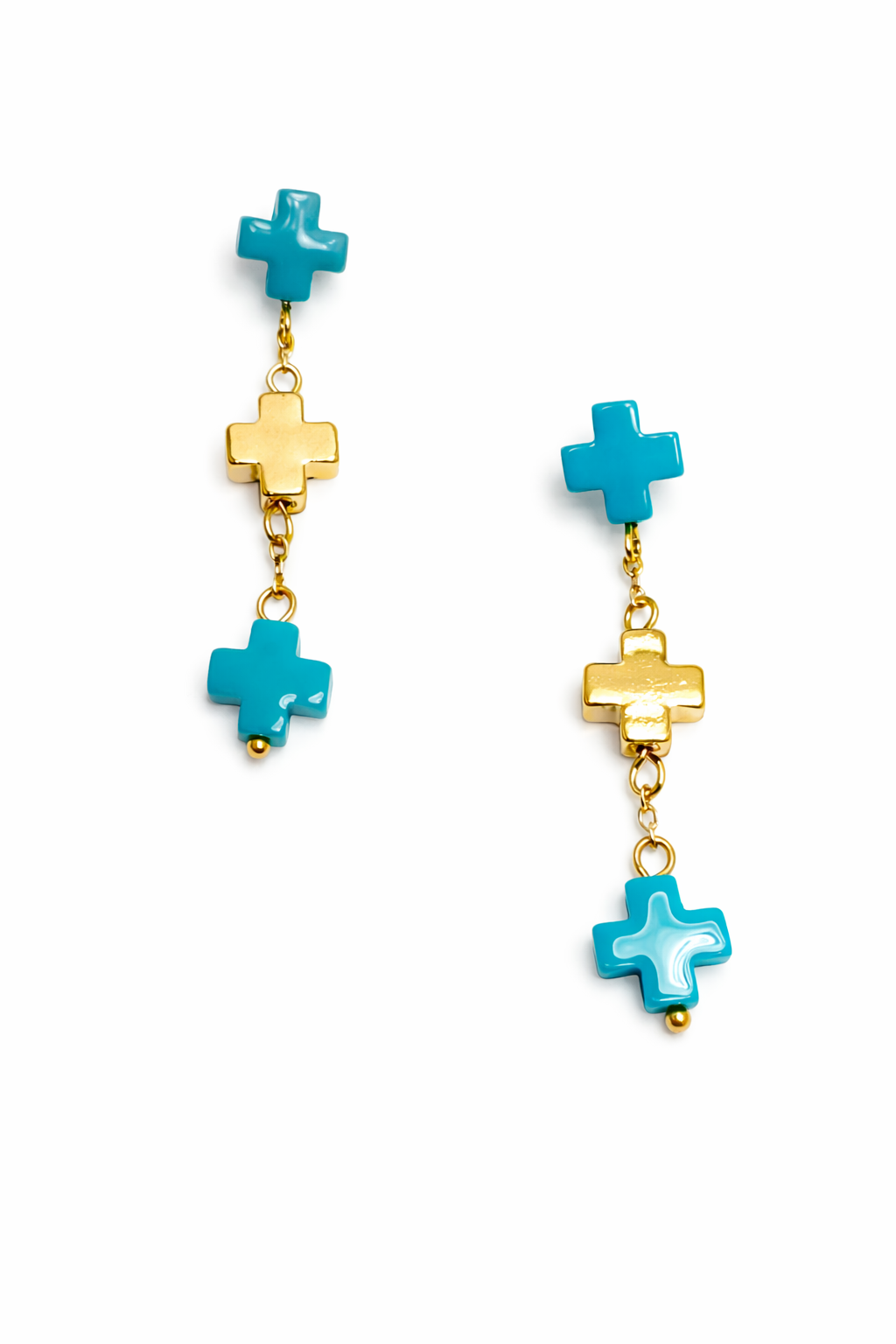 Pair of earrings with turquoise cross-shaped drops on a white background