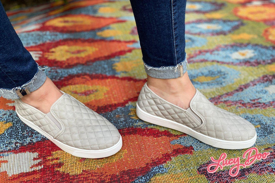 Light grey quilted slip on shoes 
