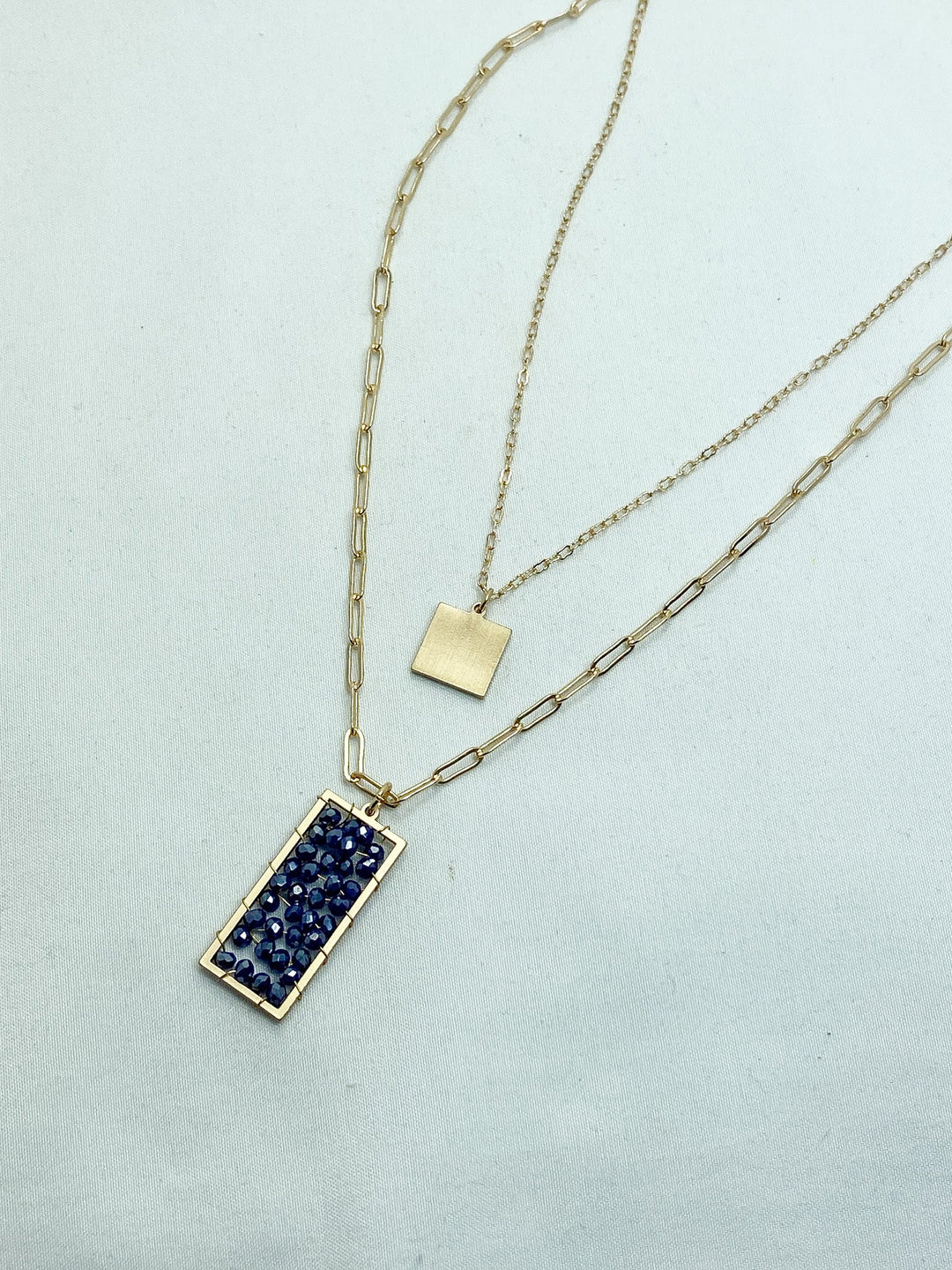 Layered Gold Necklace w/ Navy Blue Beaded Pendant - Lucy Doo